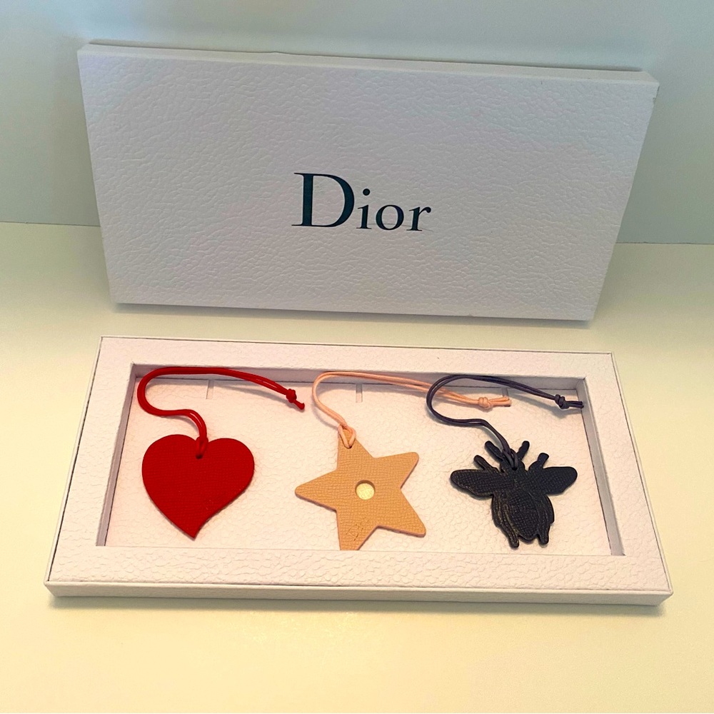 Dior trio leather bag accessories. Pink star, Red heart, Blue bee.